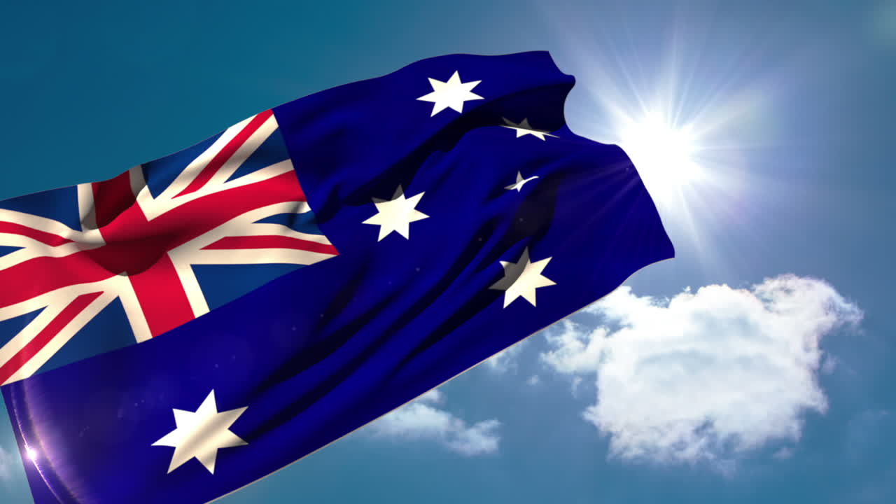오스트레일리아의 국기가 바람에 불어오고 있다.