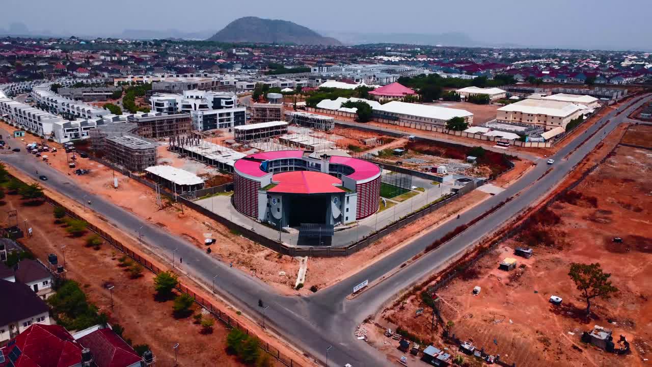 Futuristic red-roof school campus stands out in Abuja Lifecamp with clean roads