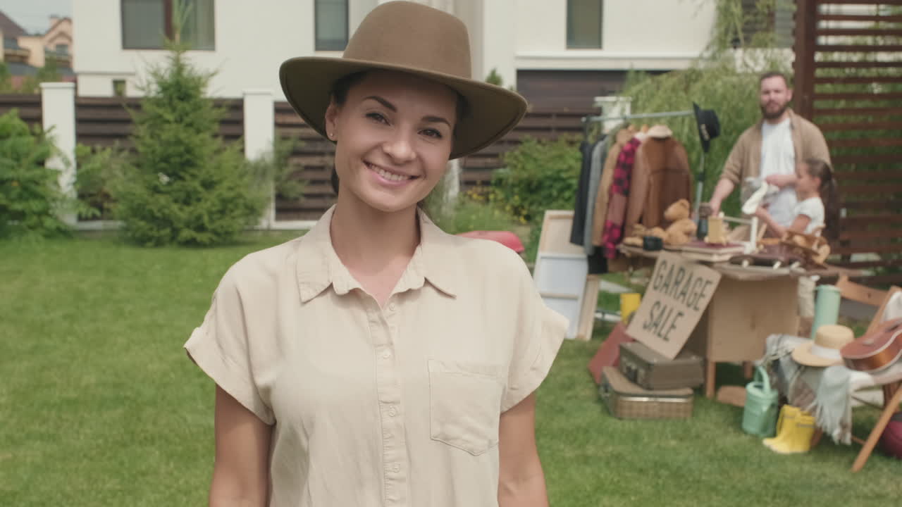 Portrait of Happy Woman Posing in Hat Outdoors