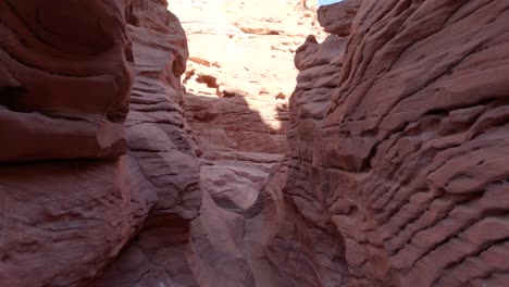 passing through a very narrow sandstone canyon, passage between the rocks