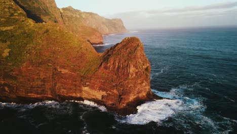 Aerial-shot-of-the-coastline-in-Madeira-at-sunrise