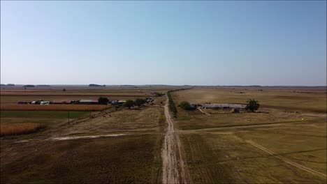 drone flying backwards in the hungarian lowland, in the big plain, the "puszta