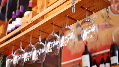 Elegant-wine-glasses-lined-up-in-a-restaurant,-ready-to-be-filled-with-fine-wines