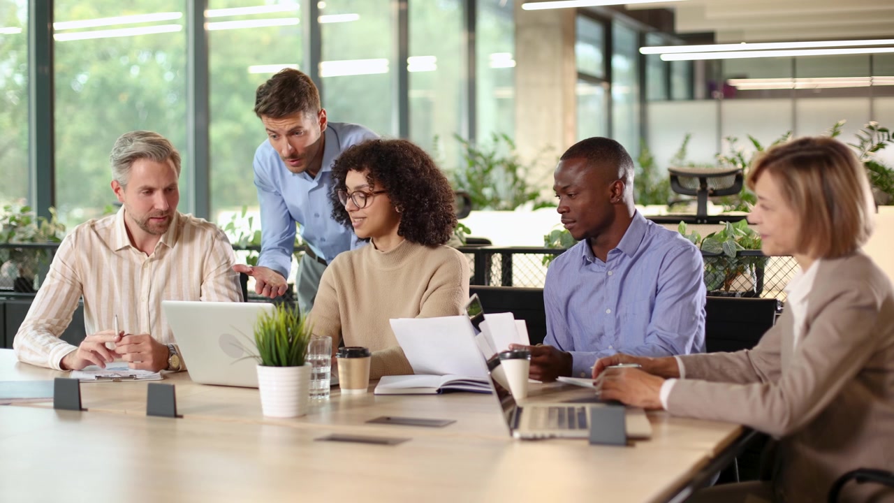 Diverse Business Team Collaborating at a Modern Office Meeting