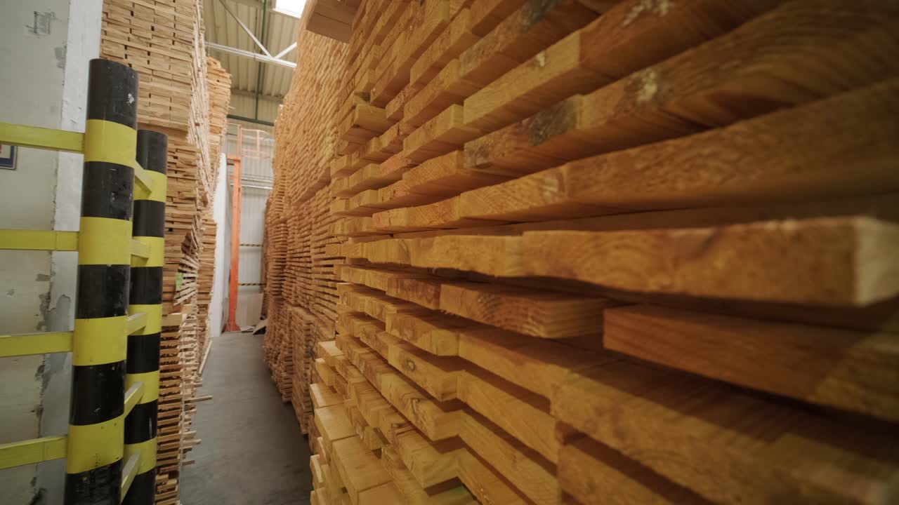 Close Up of Stacked Wooden Boards in a Warehouse