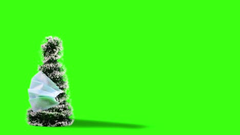 árbol de navidad en máscara médica girando en movimiento de bucle