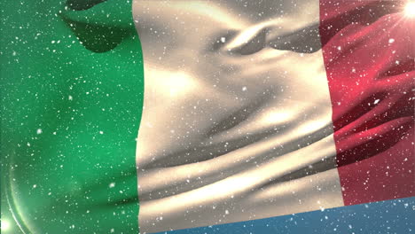 bandera italiana ondeando en la nieve