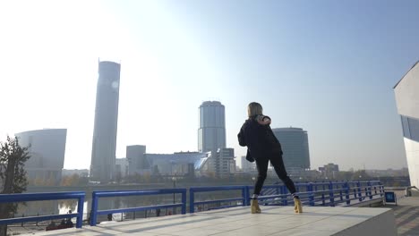 woman dancing in a city