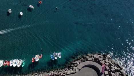 aerial shot over the pier of the city of aldea de san nicolas on the island of gran canaria