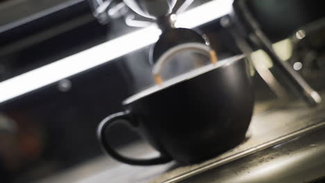 coffee machine on a wooden table slow motion