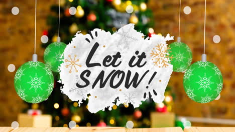 animation of let it snow christmas text and baubles on blurred decorations in background