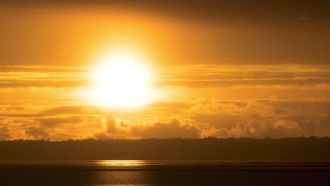 golden sunset over the water