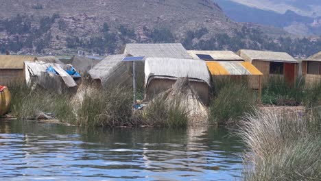 back view of uros reed houses, lake titicaca, peru