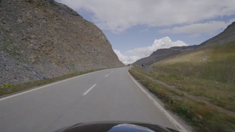 driving from the grimsel to the furka pass through the famous valley in the swiss alps