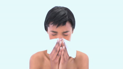 attractive woman sneezing