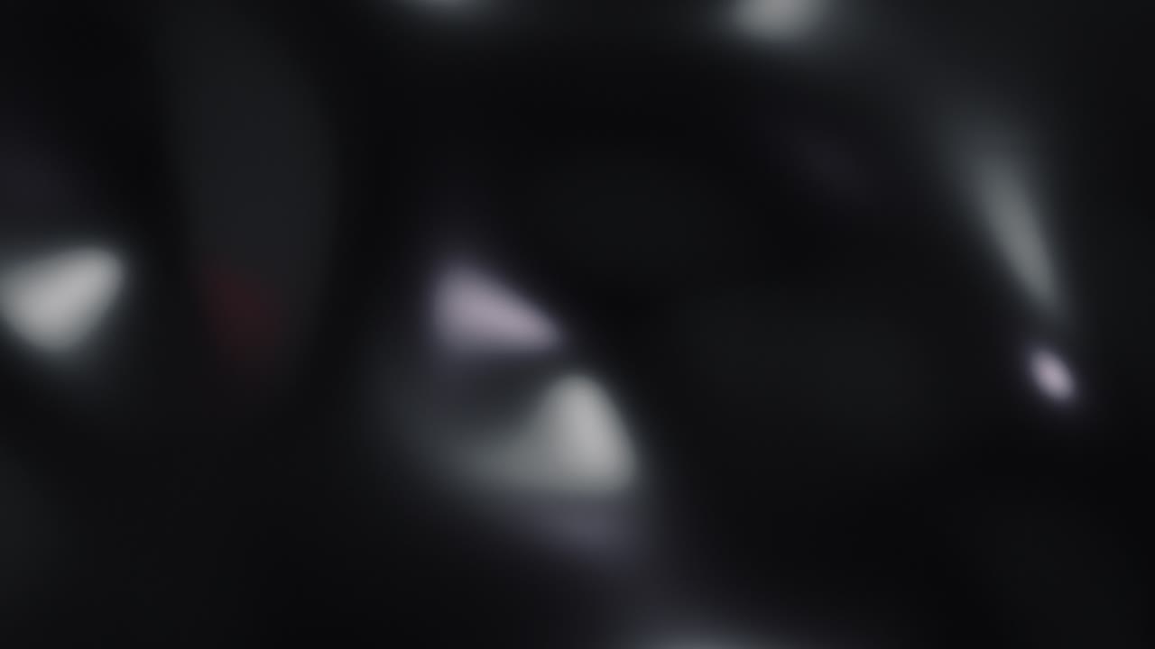 Motion Animated Black Texture Background With Blur Lights
