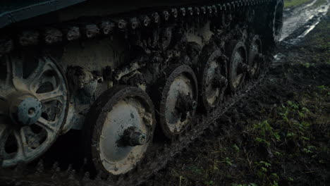 tank tracks in muddy terrain