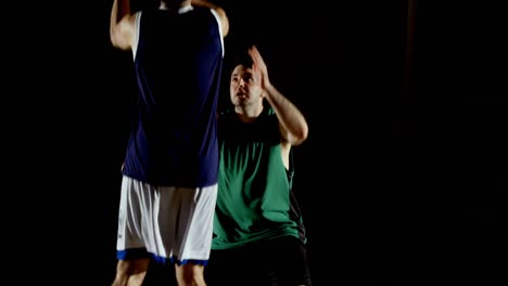 Competitors-playing-basketball-in-the-court-4k