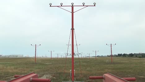 a jet airplane lands on an airport runway