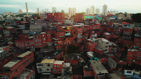 Drone-shot-around-the-Villa-lobos-shantytown,-sunny-evening-in-Sao-Paulo,-Brazil