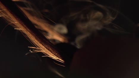 burning hair close-up