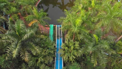 topdown view of old abandoned waterslides at thuy tien lake abandoned water park, aerial