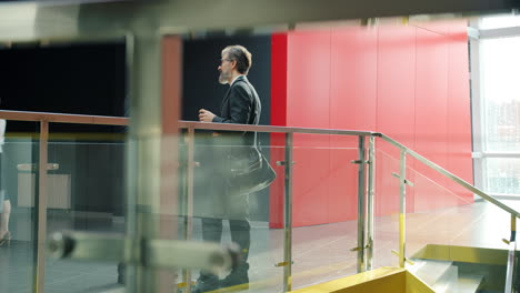 business people meeting in modern office corridor