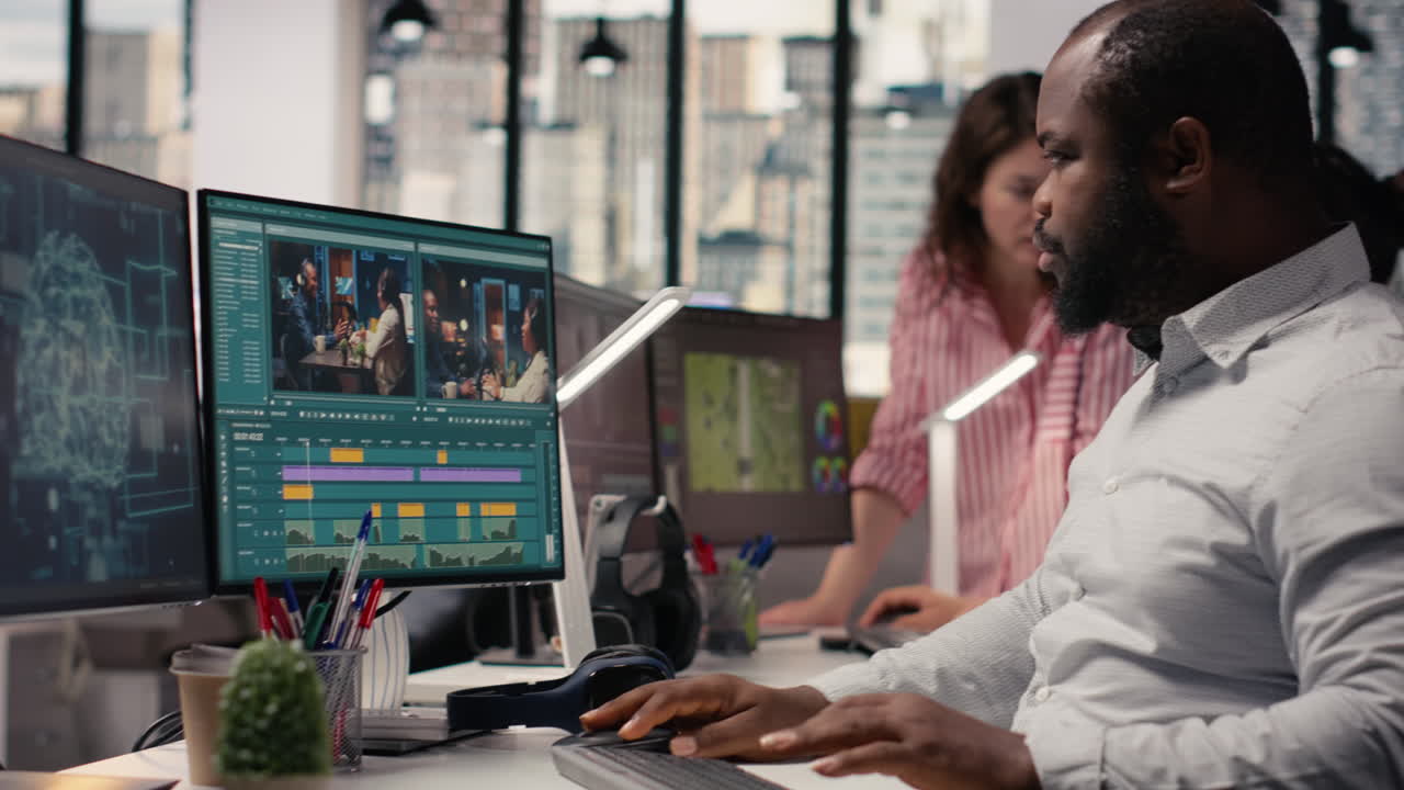Black filmmaker using AI-driven editing software for cutting montage clips