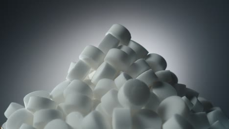 pile of big white pill rotation close-up