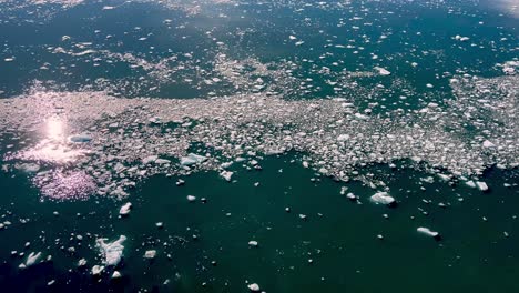 reflections in icy water near the hubbard glacier in alaska