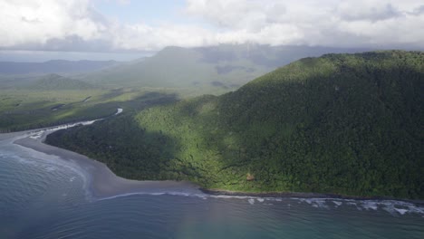 cloud shades over rainforest mountains in daintree national park, cape tribulation, far north qld, australia