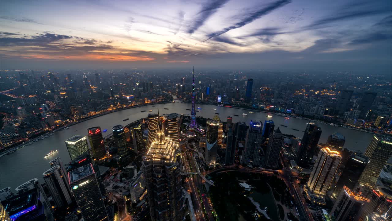 el lapso de tiempo de día a noche del horizonte y el paisaje urbano de shanghái