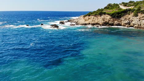 Coastal-Road-At-The-Cliff-Near-Jerusalem-Beach-In-Erisos,-Kefalonia,-Greece