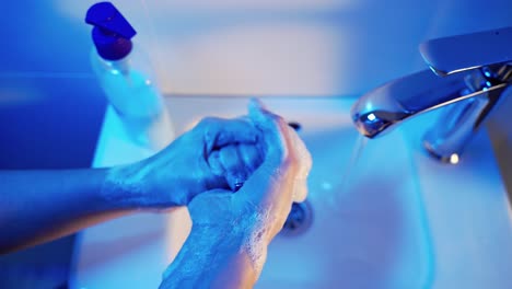 washing hands rubbing with soap man for corona virus prevention, hygiene to stop spreading coronavirus.