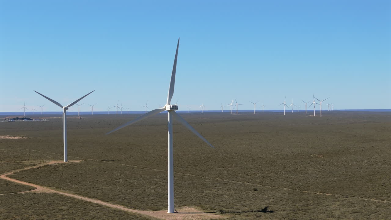 Aerial view of wind turbines operating for electric energy in Patagonia, Chubut, Argentina