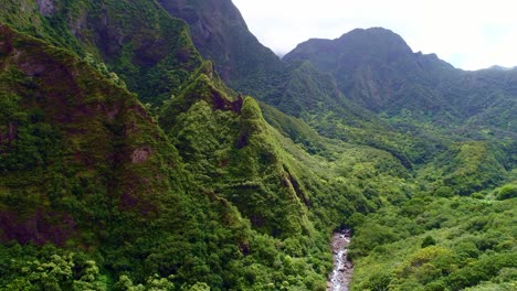 aerial view of lush green mountain valley and river