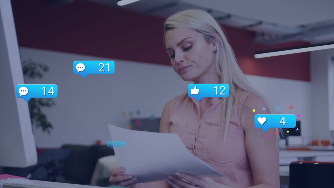 Woman typing pausing as blue icon appearing and spawning social media icons then scanning documents