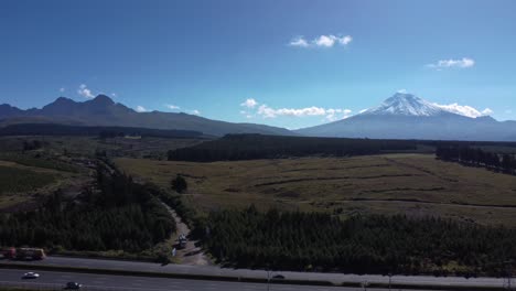 Snow-capped-volcanic-peaks-Cotopaxi-Ruminahui-from-Ecuador-highway-E35-aerial