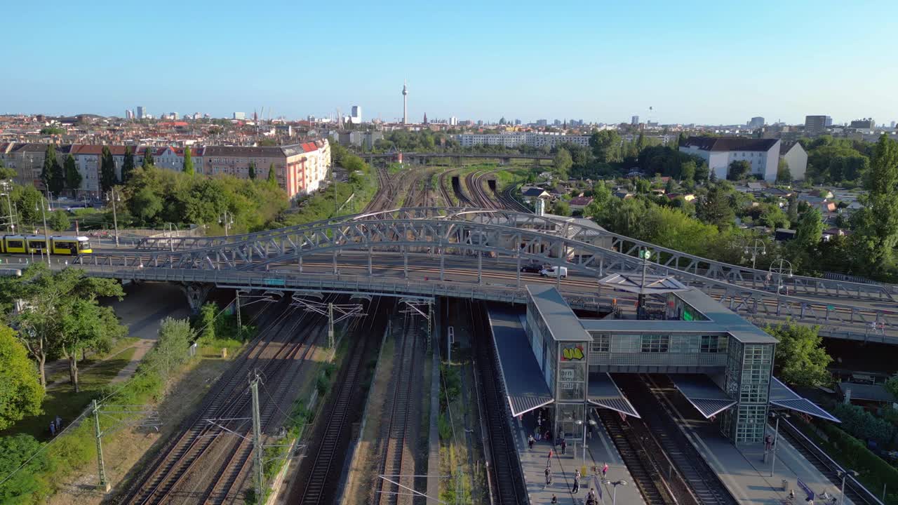 Showing the iconic bridge that connected east and west berlin, now a symbol of german reunification. Fantastic aerial view flight static tripod hovering drone