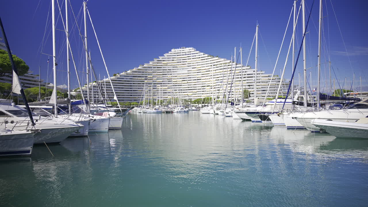 Villeneuve-Loubet, France - June 7, 2025: Boats docked in the Marina Baie des Anges in daylight