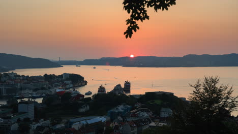 beautiful orange sunset over bergen in day to night timelapse