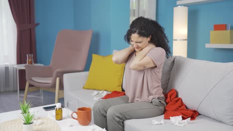 sick young woman suffering from neck pain.