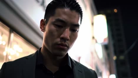 a contemplative moment: a man in evening attire reflects solemnly in the city streets, surrounded by urban lights and shadows in a nighttime setting