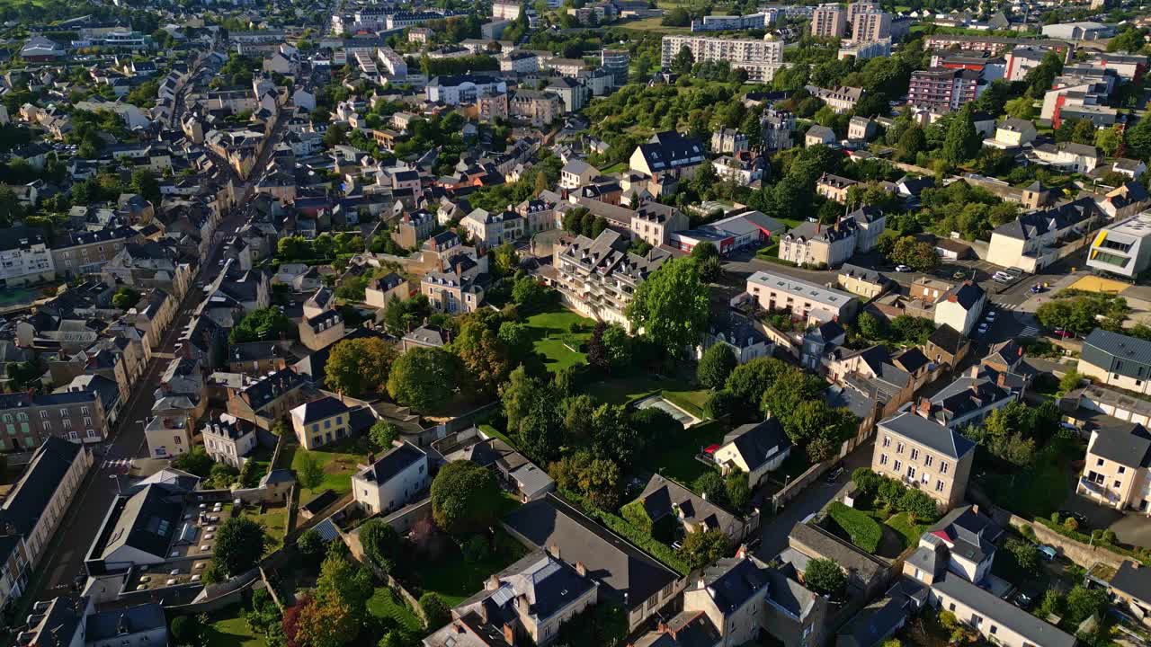 Laval cityscape, France. Aerial drone forward