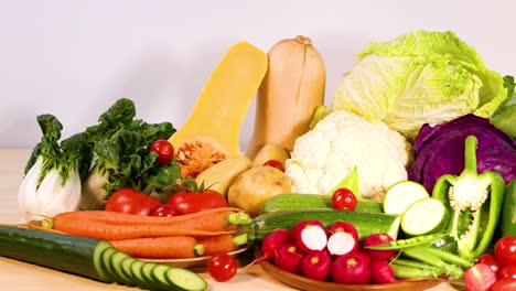 assorted vegetables arranged on a white background