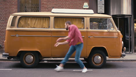 contemporary funky caucasian man street dancer dancing freestyle in the city