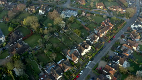 aerial drone footage of a english town with houses in global coronavirus pandemic lockdown