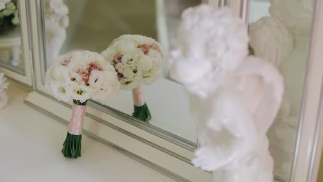 there is a beautiful bouquet of flowers on the mirror in the bedroom. shooting holiday items