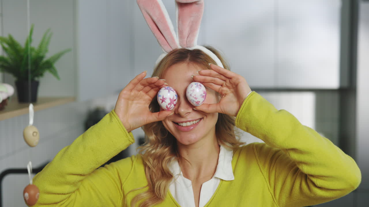 Woman with Easter Eggs and Bunny Ears