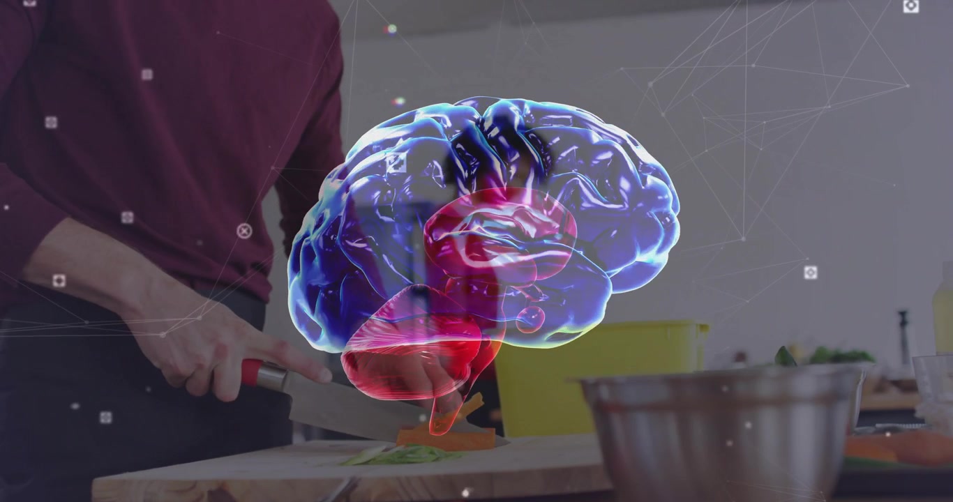 Man grabbing chef knife chopping carrots at counter for mixing as healthtech brain graphic spinning